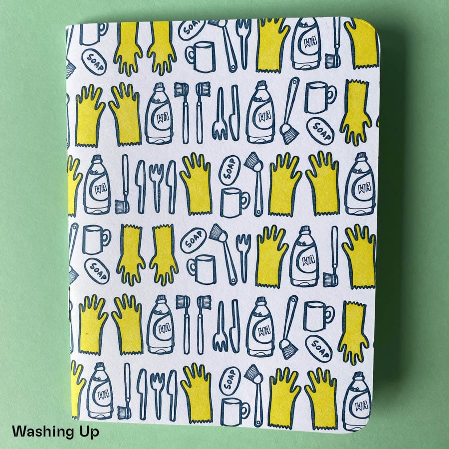 Pocket notebook with letterpress cover depicting rows of illustrated washing up paraphernalia in indigo and yellow